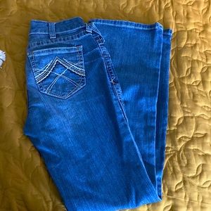 Pretty new Ariat jeans. Worn 2xs. Smoke free home. No rips no stains